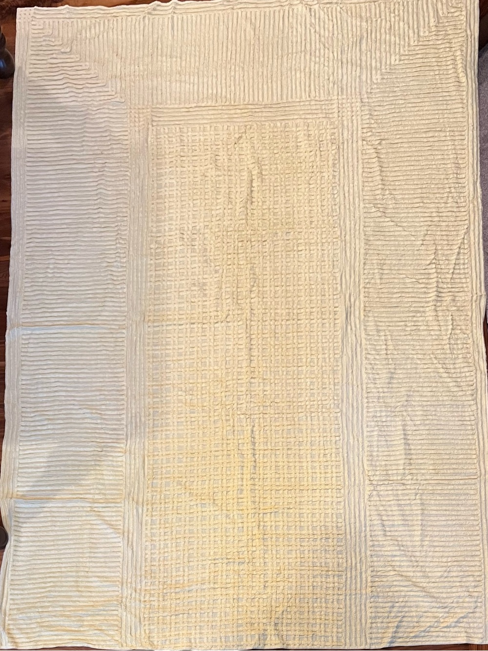 Vintage yellow cotton chenille bedspread featuring a geometric mix of linear rib